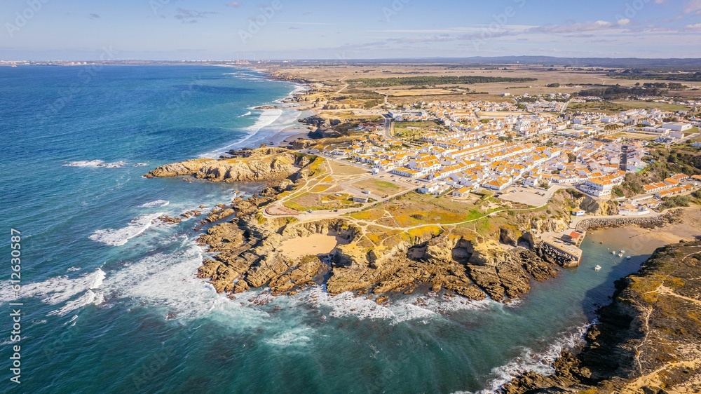 Aerial view of Zambujeira do Mar - charming town on cliffs by the Atlantic Ocean in Alentejo