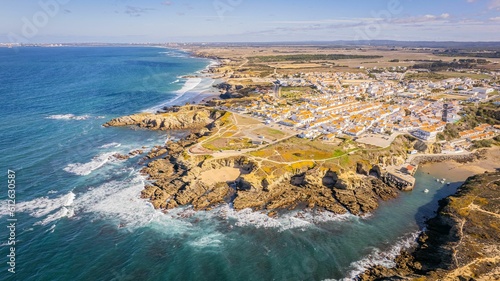 Aerial view of Zambujeira do Mar - charming town on cliffs by the Atlantic Ocean in Alentejo