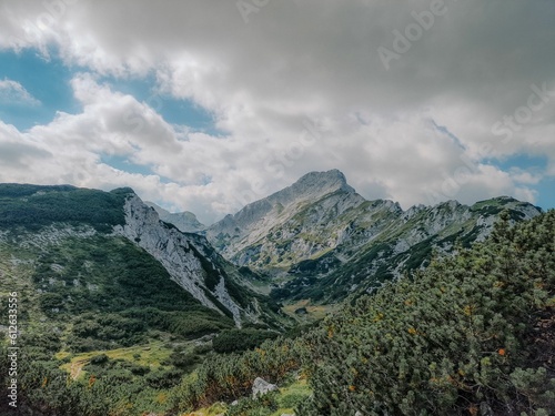 Landscape of Mountain Ojstrica from a hiking path, Slovenia, Kamnisko savinjske alpe photo