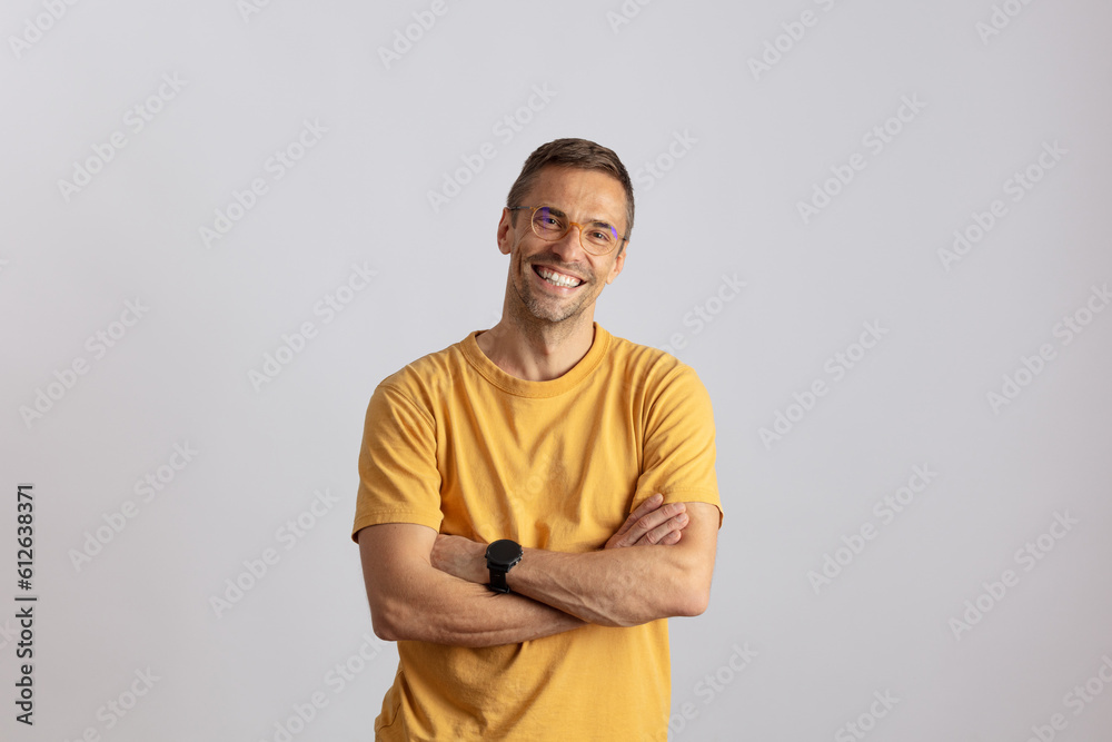 Man with a big smile and a yellow T-shirt Man with a big smile and a yellow T-shirt