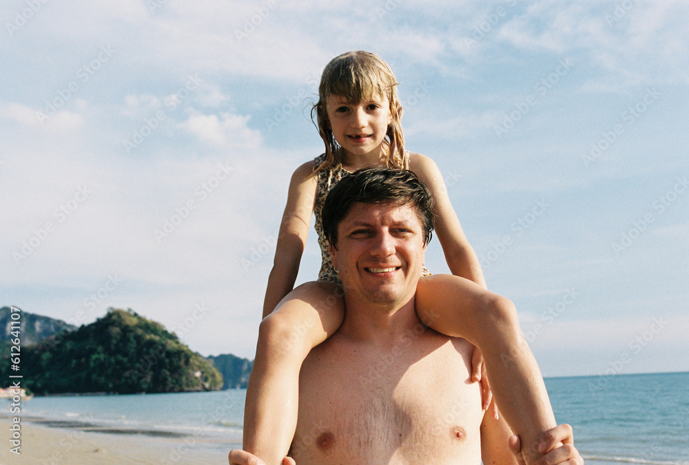 Father with daughter on the beach Father with daughter on the beach