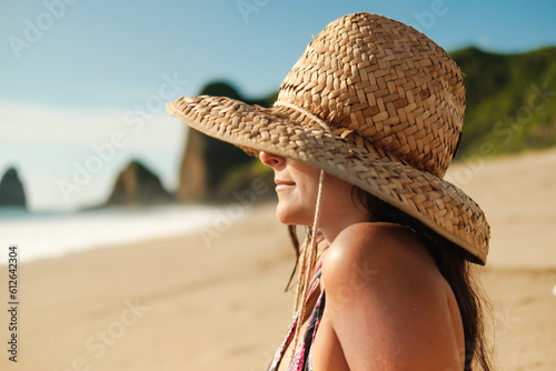 summer portrait of woman at the beach photo