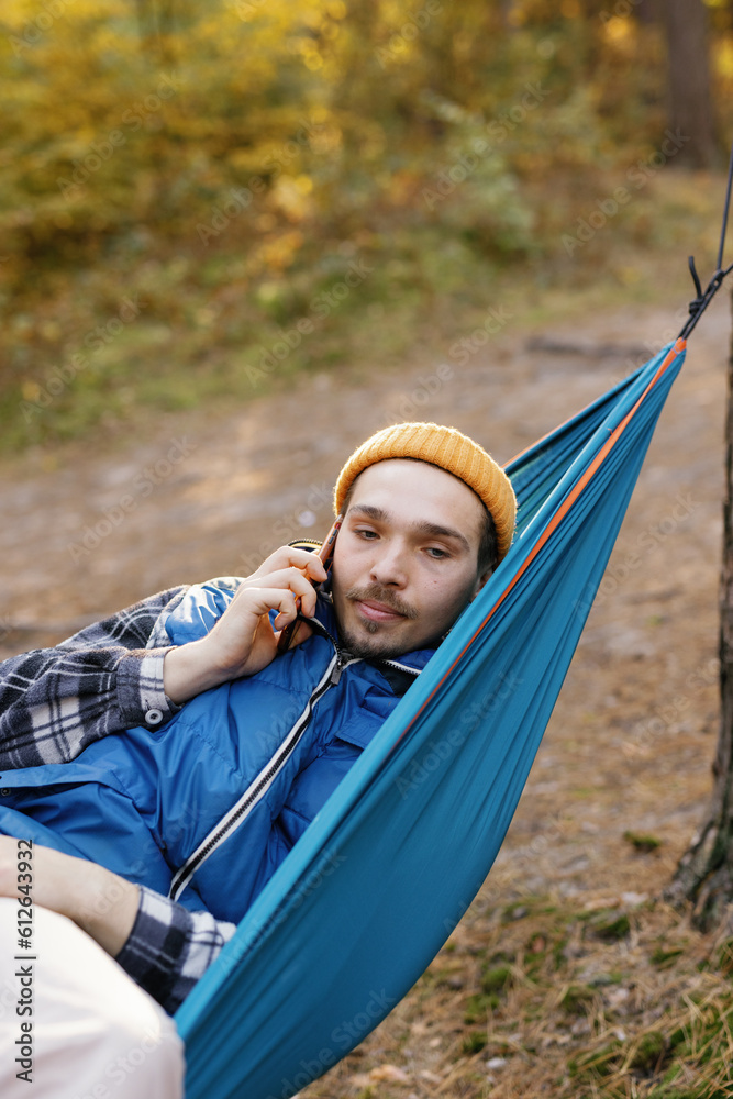 Hammock call cellphone outside disappointment communication 
