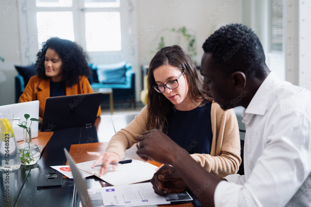 © Bruce and Rebecca Meissner/Stocksy - Boardroom Meeting