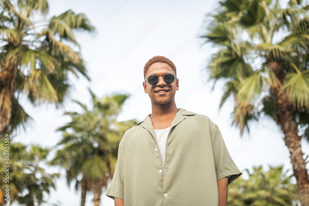 Enjoying life outdoors. portrait of happy young black man Enjoying life outdoors. portrait of happy young black man