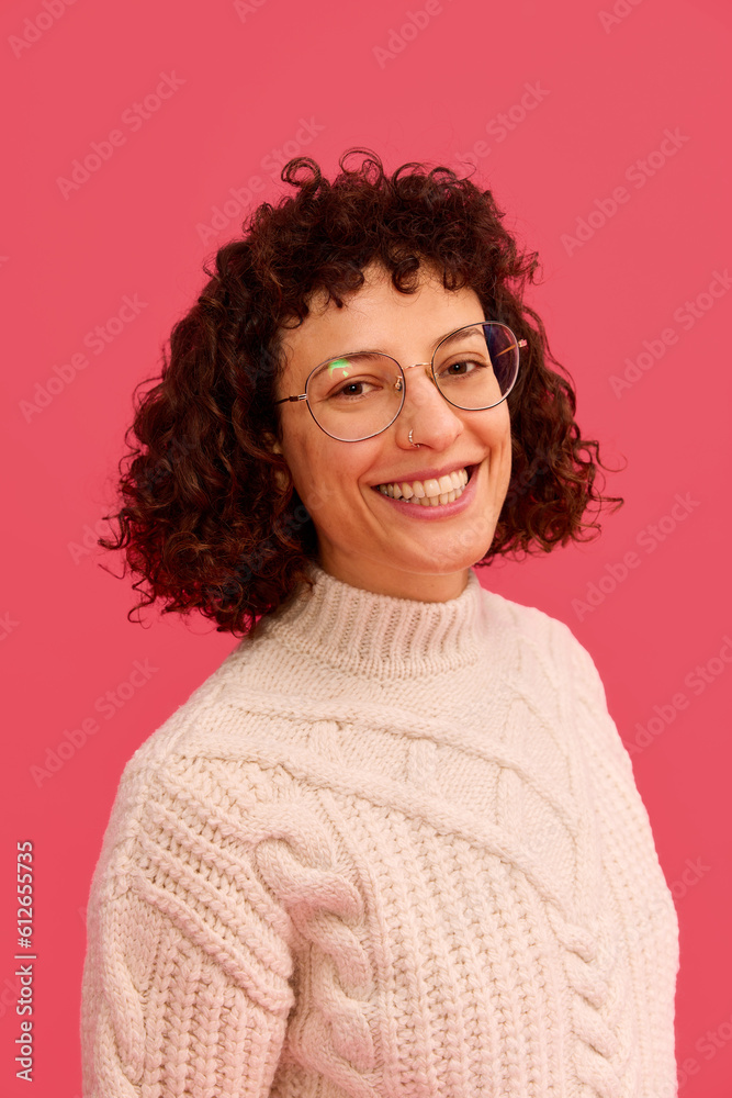 Joyful woman laughing and looking at camera in studio Joyful woman laughing and looking at camera in studio