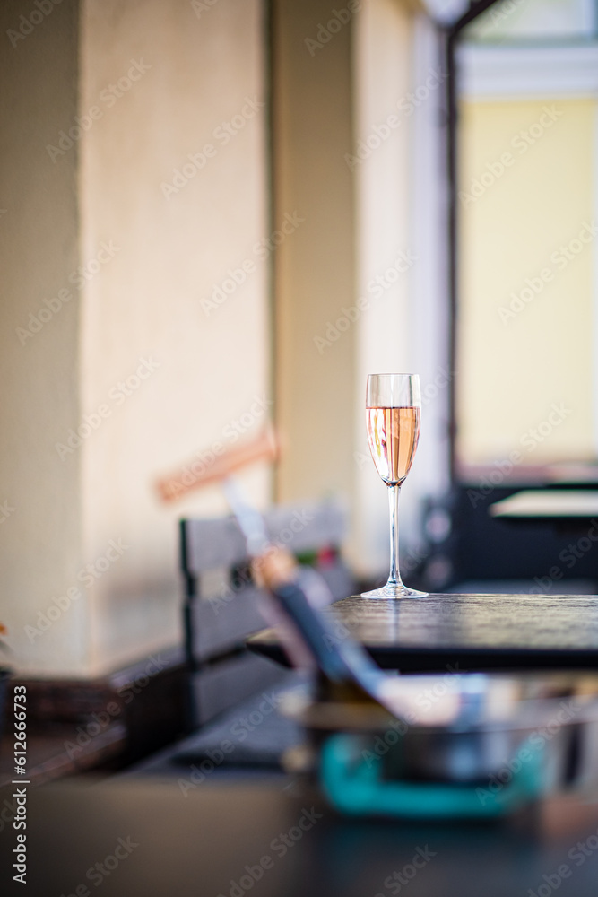 Glasses of   wine on a table in a restaurant, close-up