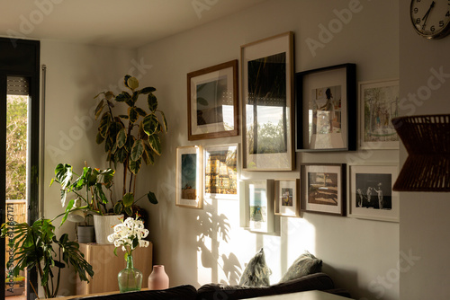 framed pictures on living room wall