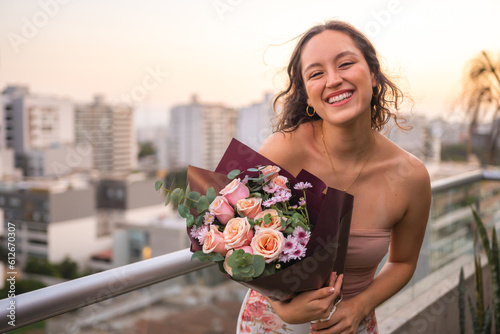 Woman holding flowers photo