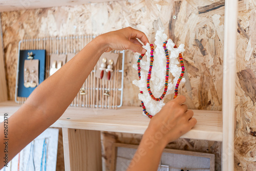 woman buying items from an accessories store photo