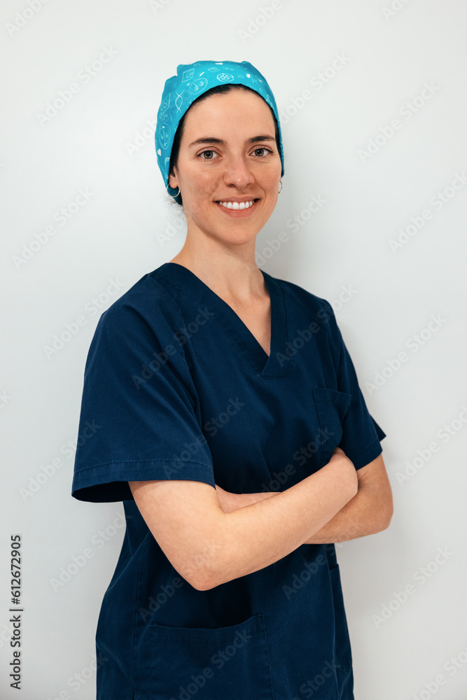 Smiling woman biologist standing with crossed arms Smiling woman biologist standing with crossed arms