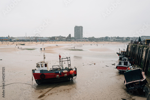 Boat at low tide in Margate.  photo