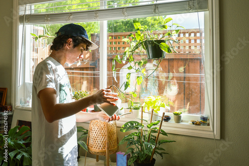 Teenager Caring for Plants