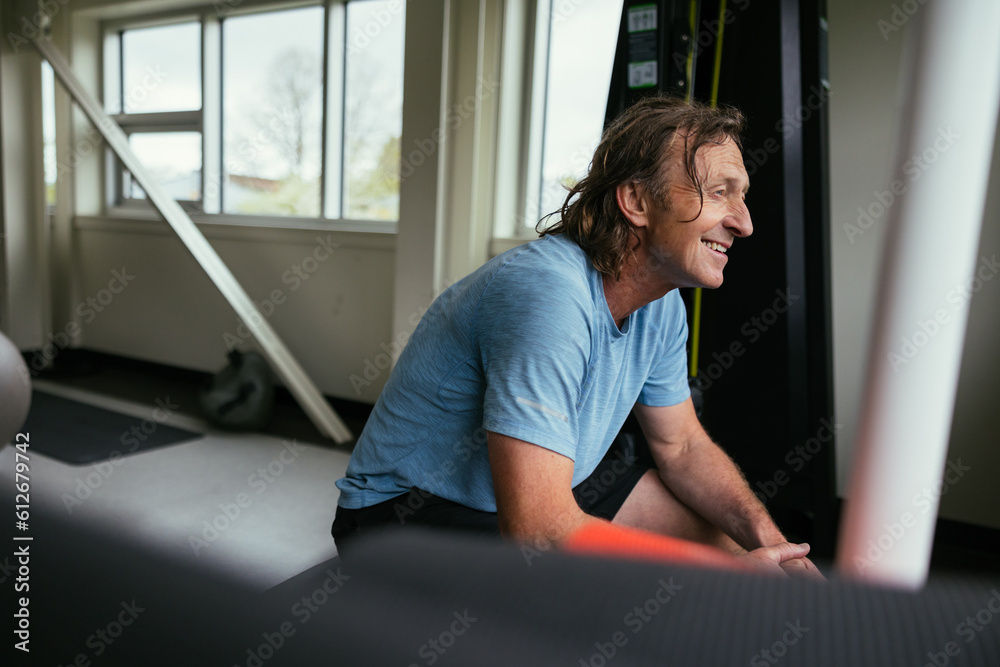 Sweaty, tired, happy older man recovering after workout. Sweaty, tired, happy older man recovering after workout.