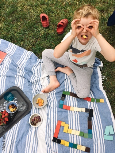 a kid playing domino photo