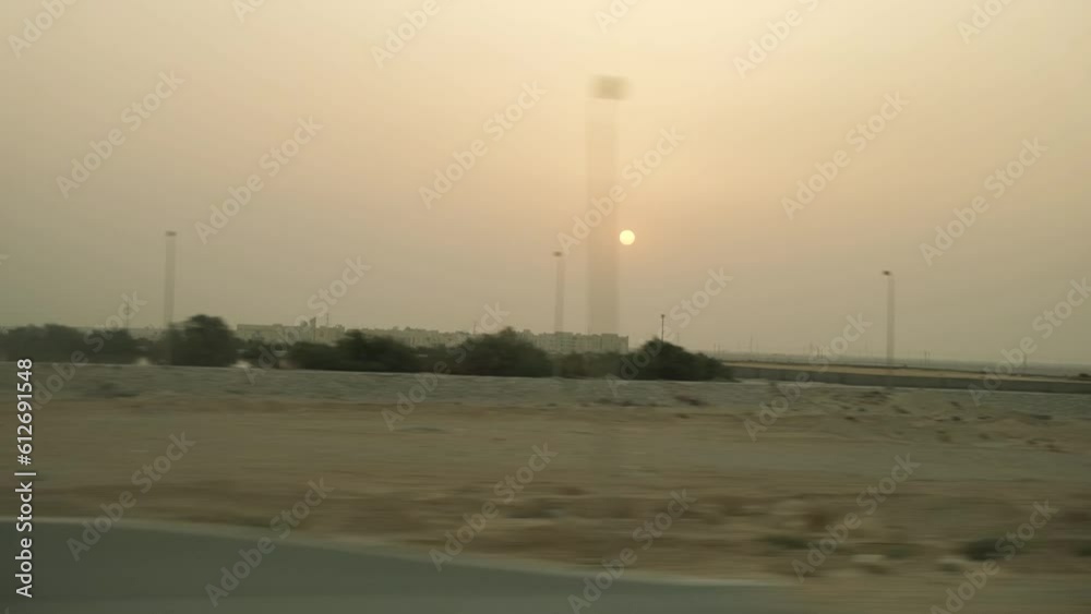A track in the desert, a view from the window of a car walking along a road in the desert. A track in the desert, a view from the window of a car walking along a road in the desert.