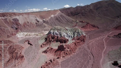 Drone Footage of Red, Green, White Rock Formation at Rainbow Valley near San Pedro de Atacama, Chile. photo