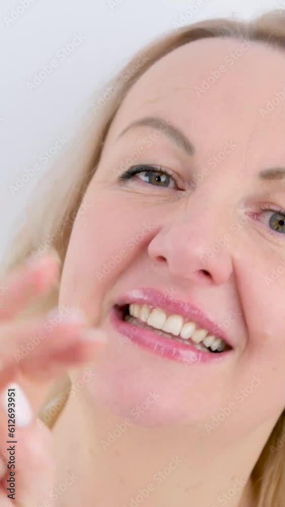 Close up of isolated female hand shows fist fist, then one, two, three, four, five fingers female hand counting from 0 to 5 on white background. Close up of isolated female hand shows fist fist, then one, two, three, four, five fingers female hand counting from 0 to 5 on white background.