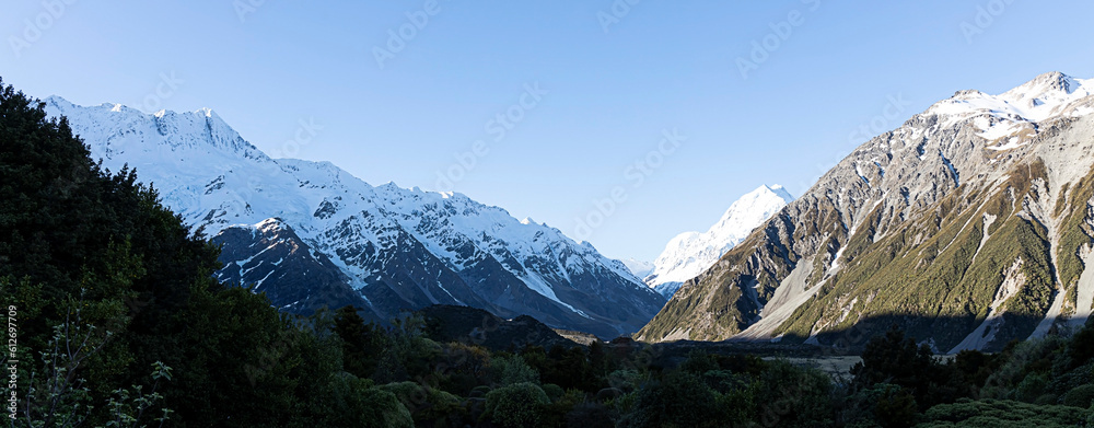 The mountain view of  alpine as snow-capped mount peaks in  Winter mountains, panorama scene