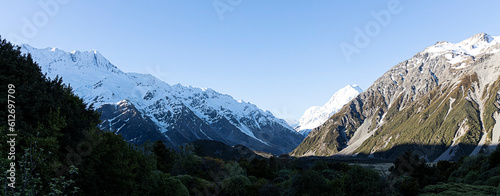 The mountain view of alpine as snow-capped mount peaks in Winter mountains, panorama scene
