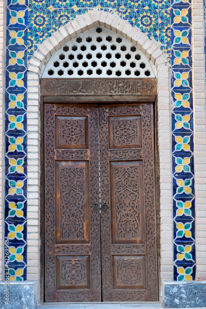 closed door in a wall of different pattern