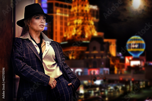 Photography Woman in a suit with a cigarette against the background of the city at night