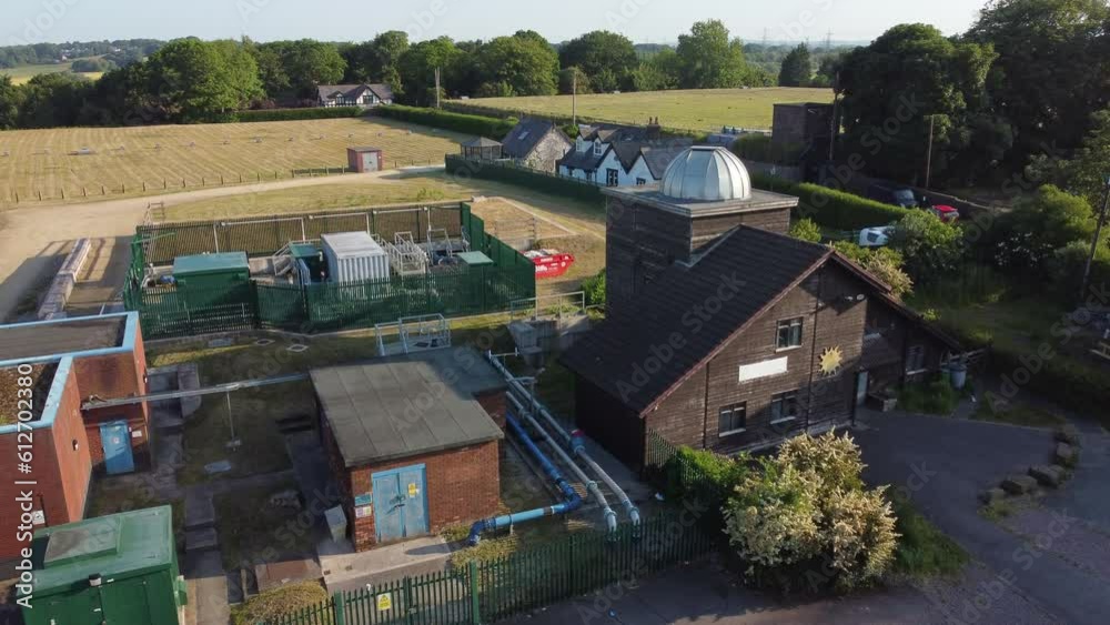 Aerial view Pex hill Leighton observatory silver dome rooftop on hilltop farmland at sunrise, slow push in Aerial view Pex hill Leighton observatory silver dome rooftop on hilltop farmland at sunrise, slow push in