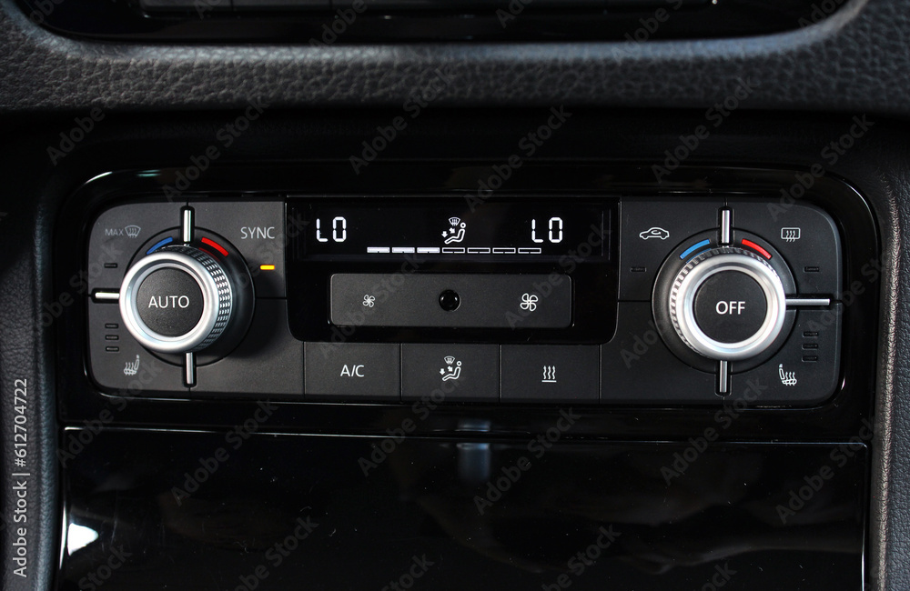 Air conditioner with power regulator. Car climate control. Automotive climate control. Modern Car air conditioner, interior of a new modern car.