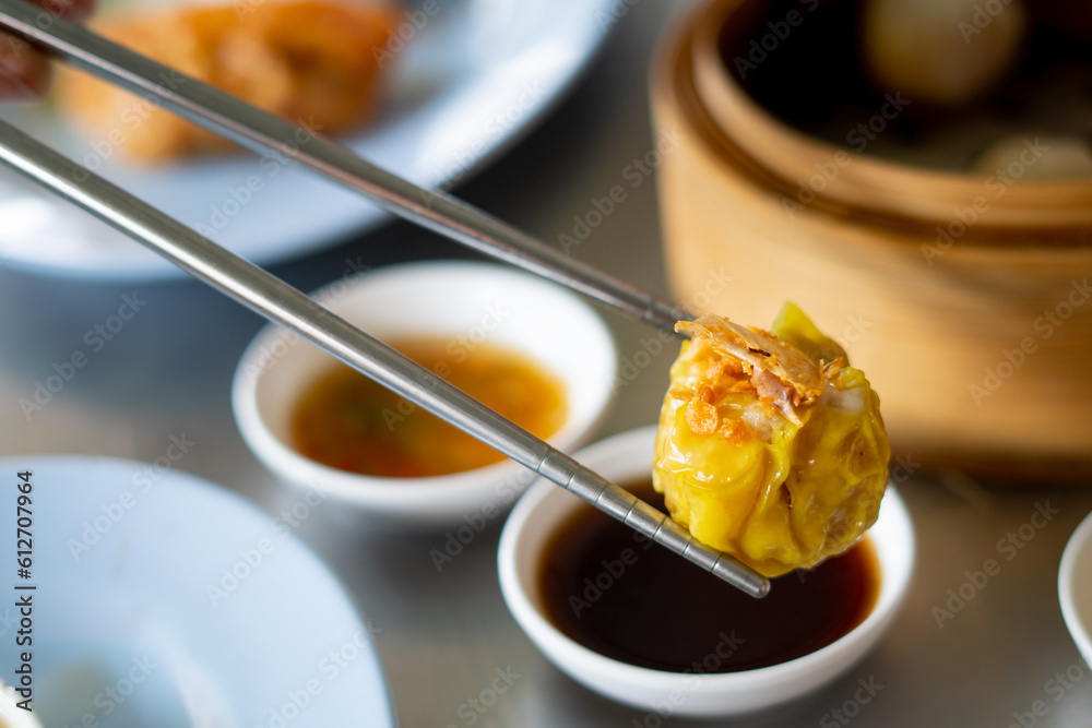 Siu Mai Chinese steamed pork dumplings in bamboo steamers. Stock