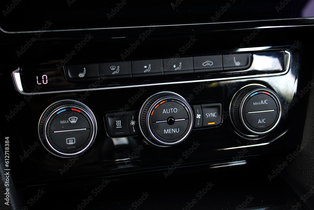 Air conditioner with power regulator. Car climate control. Automotive climate control. Modern Car air conditioner, interior of a new modern car.