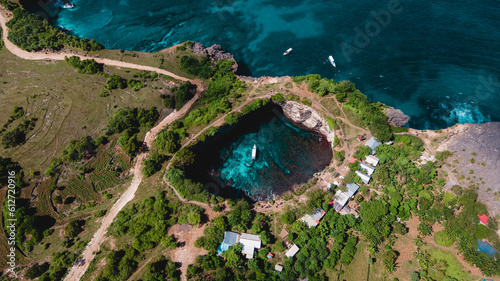 Aerial drone view of the Broken Beach, Nusa Penida, Bali. stunning Broken Beach locally known as Pantai Pasih Uug. photo