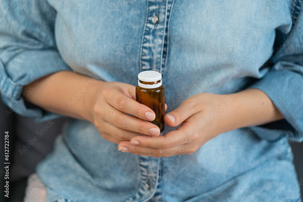 Female hands with jar and pills into palm. Pills and drugs, medicament, vitamins. Take medicine, take pill. Medicine and healthcare Female hands with jar and pills into palm. Pills and drugs, medicament, vitamins. Take medicine, take pill. Medicine and healthcare