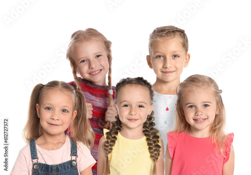Group of cute little girls on white background