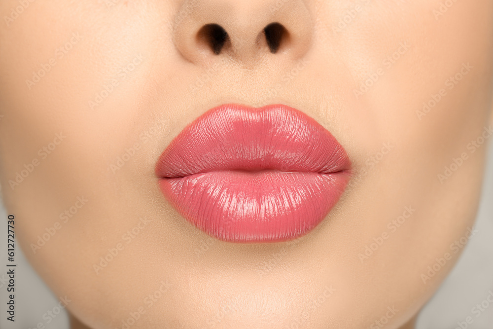 Obraz premium Closeup view of woman with glossy lipstick