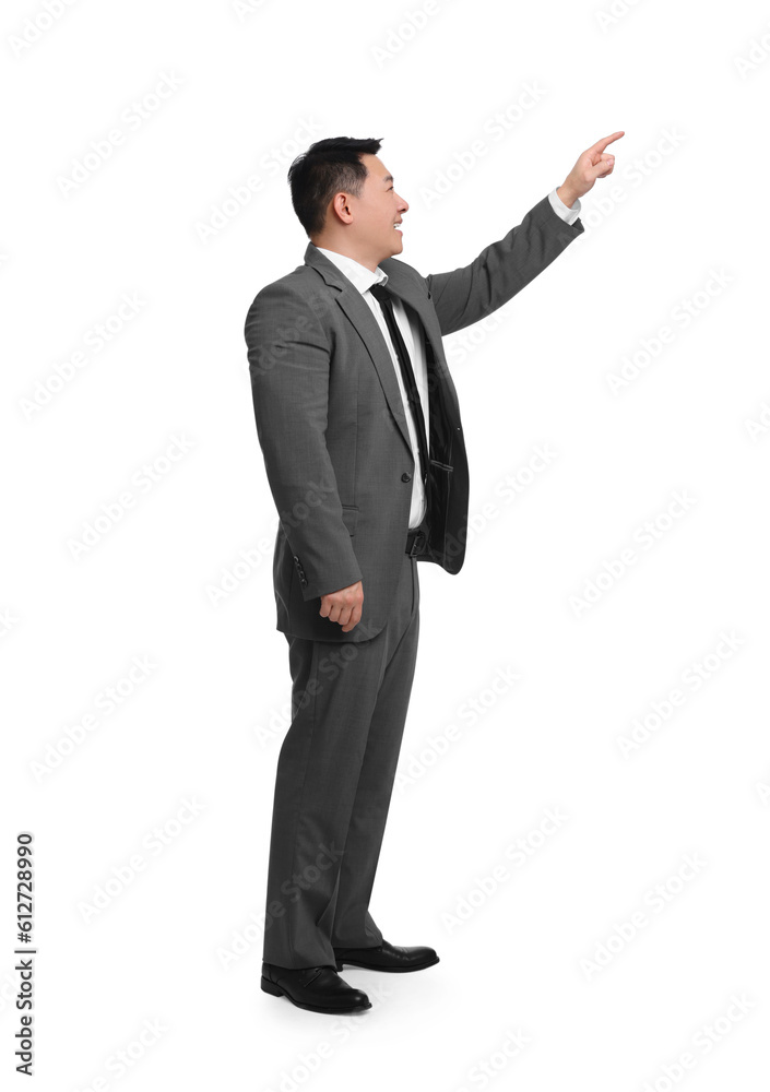 Businessman in suit posing on white background Businessman in suit posing on white background