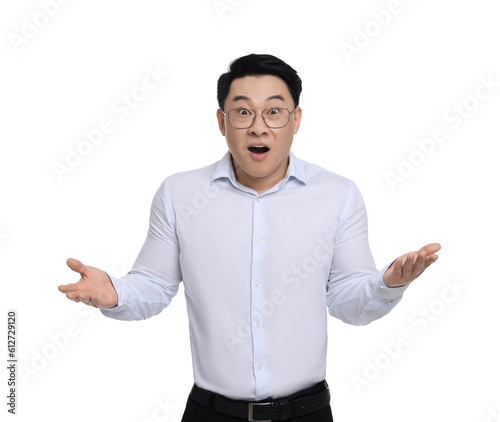 Confused businessman in formal clothes wearing glasses on white background