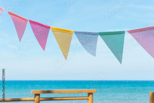 Quadro su tela Sea view and flag garland.  海の景色と旗のガーランド