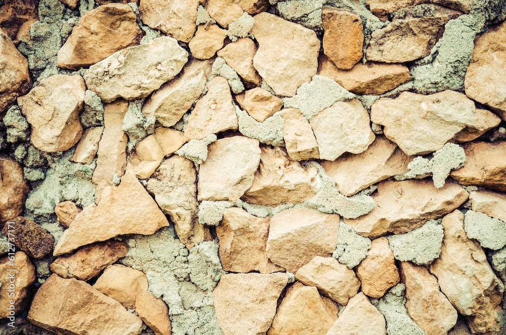 Fototapeta premium Wall background or texture. Old stone and brick texture.