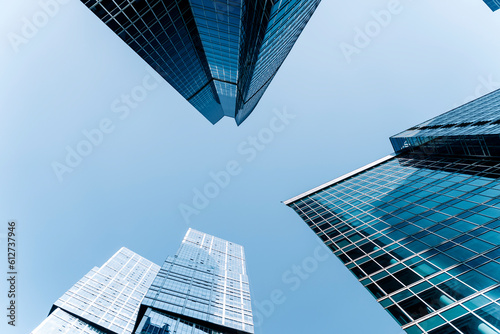 Business skyscrapers and office business center building architecture in perspective on blue sky. Economy  exchange  finance concept.