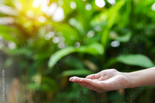 Technology,   Hands holding  globe of tropical nature summer background, © panomporn