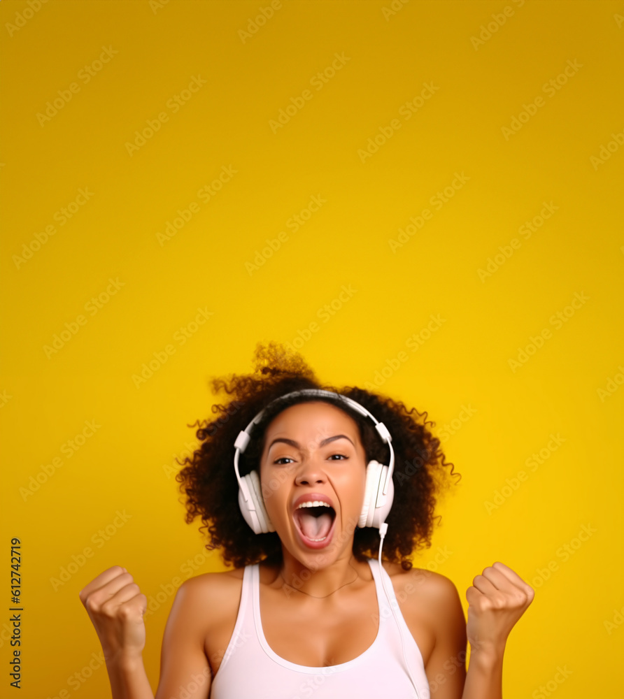 Fototapeta premium Happy, energetic woman listening to music. Isolated on bright yellow background. Banner, copy space.