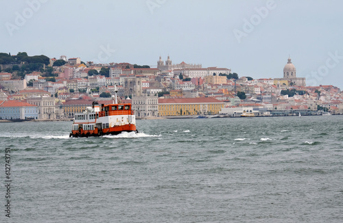Old ferry crossing the water in Lisbon, Portugal