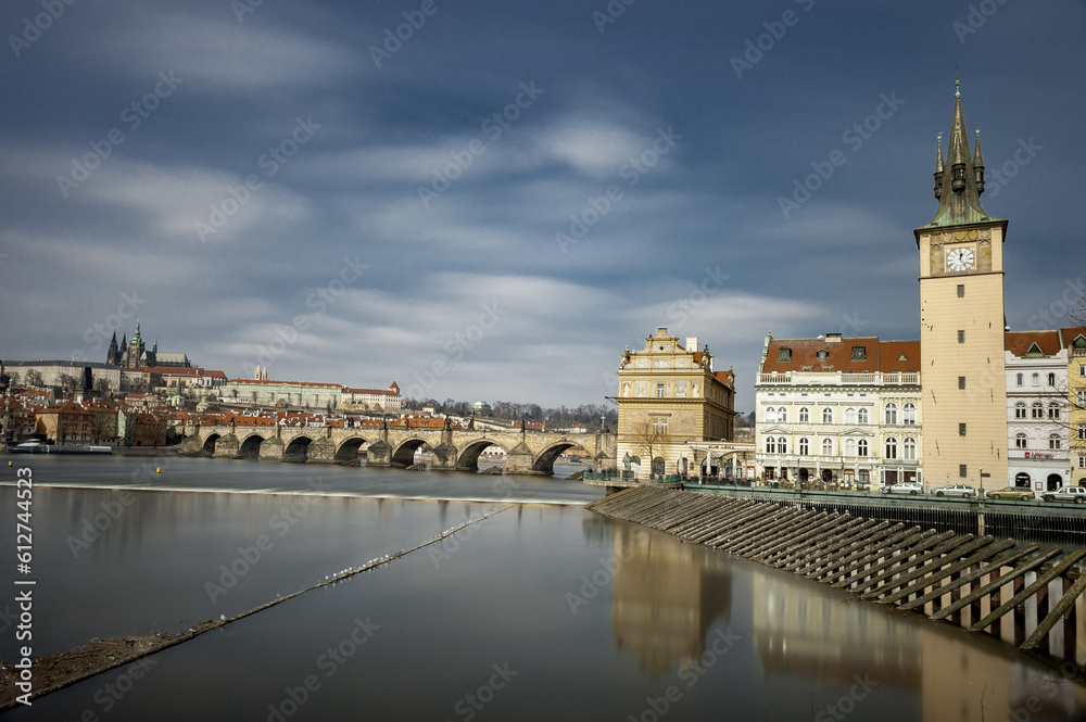 Cityscape of Prague, Czech. Charles Karluv Bridge. St. Vitus Cathedral. Daytime Long Exposure with Filter.