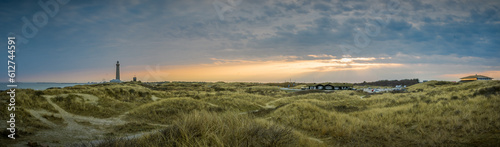 Panorama view of coastline with the famous Skagen Grey Lighthouse, Skagen Grå Fyr, Skagen, Grenen in North Jutland in Denmark,Skagerrak,North Sea, Baltic Sea. photo