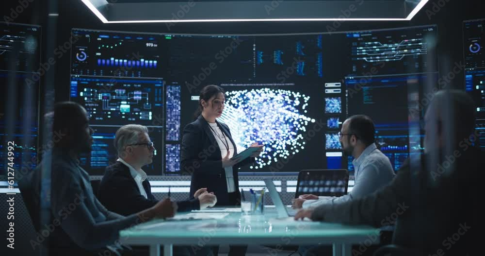 AI Operations Manager Holding a Meeting with a Group of Corporate Partners and Investors. Diverse Team of Managers, Analysts and Board Members Having a Meeting in Front of Big Digital Screen