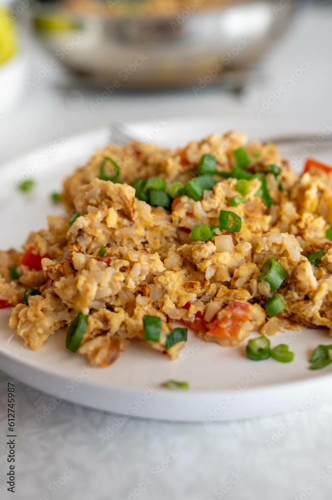 Fried rice with scrambled eggs and vegetables. Cooked with whole grain or brown rice. Fried rice with scrambled eggs and vegetables. Cooked with whole grain or brown rice.