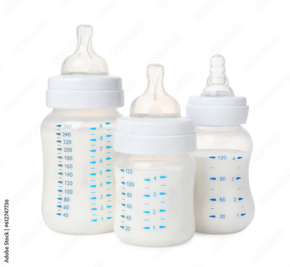 Three feeding bottles with milk on white background Three feeding bottles with milk on white background