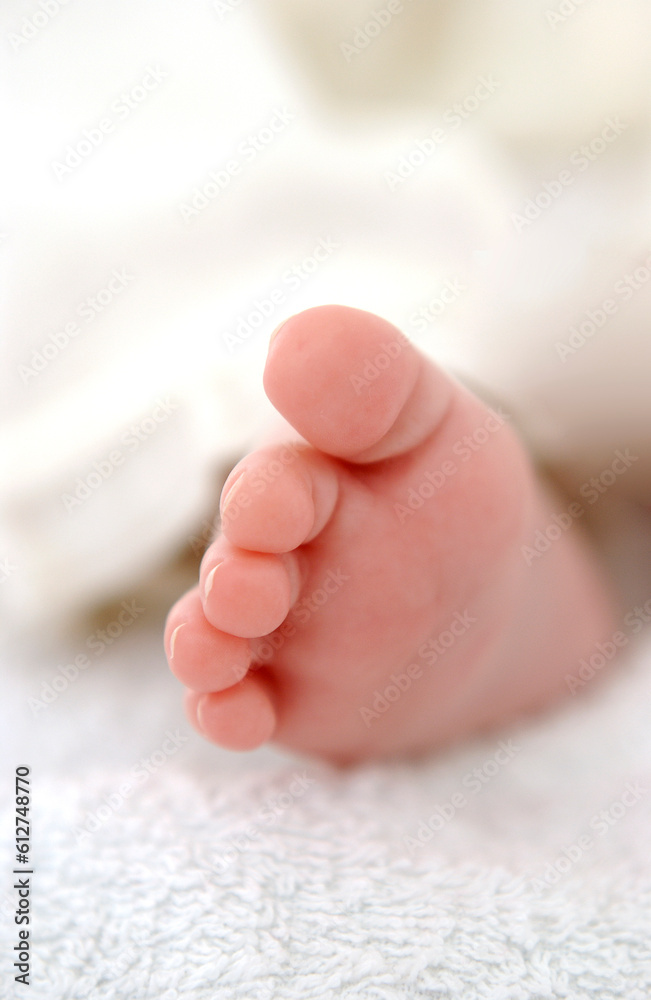 Tiny newborn baby foot close up Tiny newborn baby foot close up