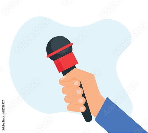 Hand holding the microphone. Live news, journalist, interview concept
