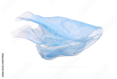 Beautiful light blue tulle fabric flying on white background